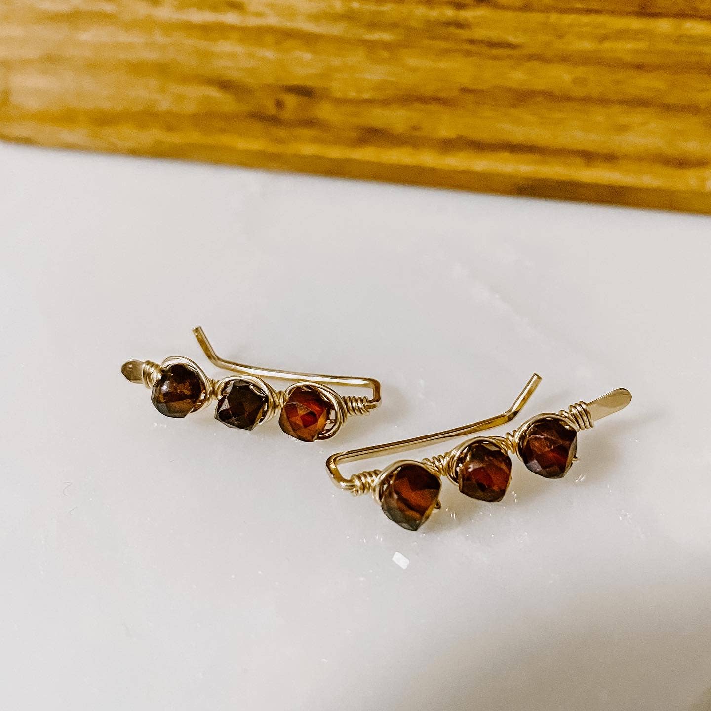 shopping-for-ember-glow-garnet-ear-climbers-sale_0.jpg